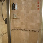 Travertine Tile comes in many colors and makes an excellent material for a natural stone shower wall