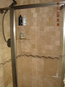 Travertine Tile comes in many colors and makes an excellent material for a natural stone shower wall