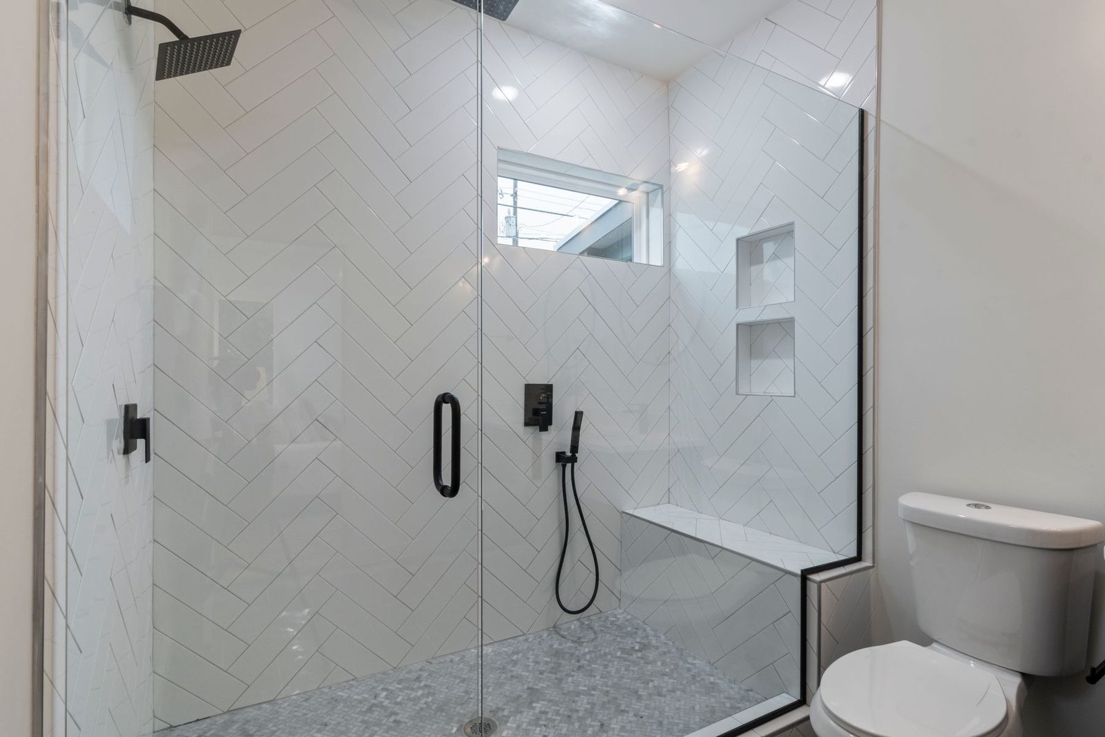 Bathroom with walk-in shower and glass doors