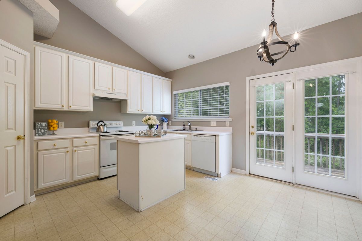 Bright white kitchen with French doors – – Ocean City home remodeling